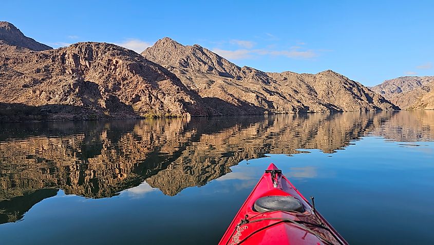 The calm waters of Lake Mohave surrounded by rugged hills