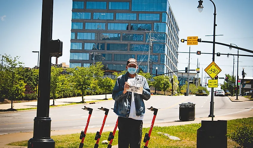 Homeless Veteran wearing a mask, asking for help during global covid-19 pandemic, Nashville, Tennessee