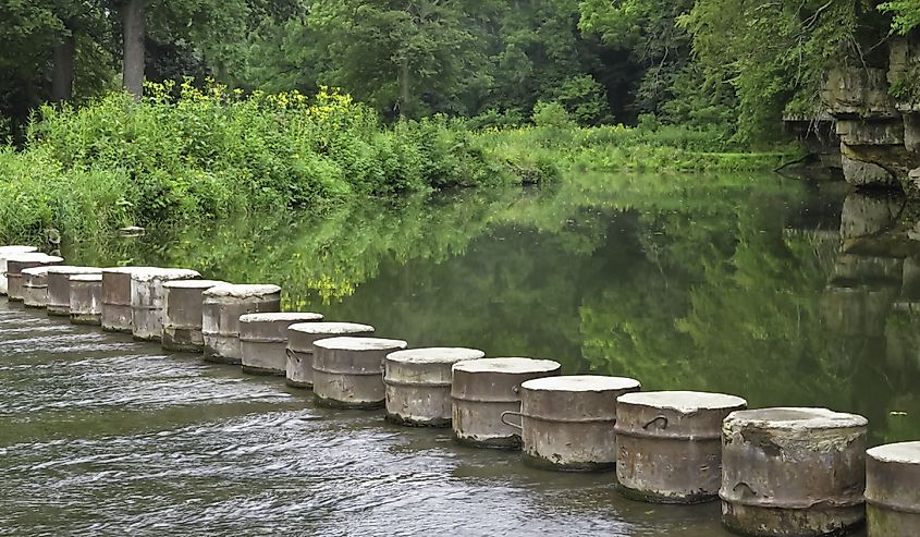 Step-stone bridge across stream in summer, White Pines Forest State Park, Mt. Morris, Illinois