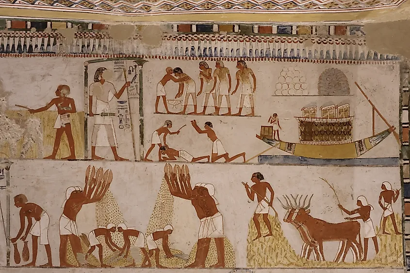 An everyday life scene carved and painted on an inner tomb wall in the Tombs of the Nobles in Luxor, Egypt