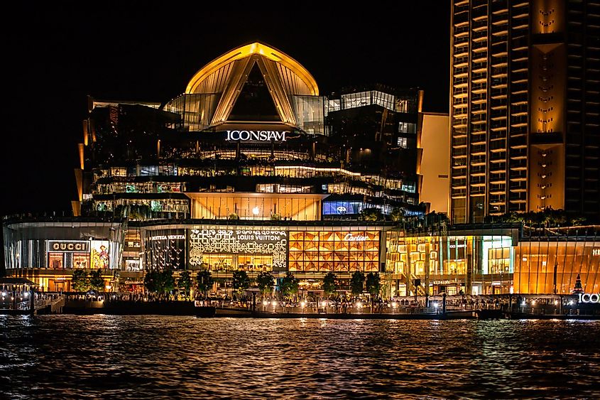 Waterfront of ICONSIAM shopping mall at night.