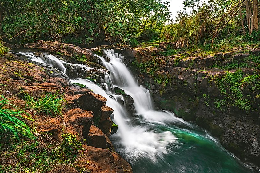 A side view of Hoʻopiʻi Falls, located near Kapaʻa on the island of Kauai, Hawaii.