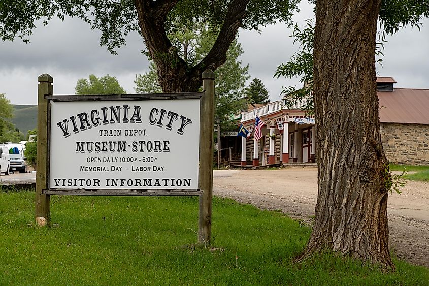 Sign and exterior for the Train Depot and Museum Store in the historic ghost town of Virginia City, Montana, via melissamn / Shutterstock.com