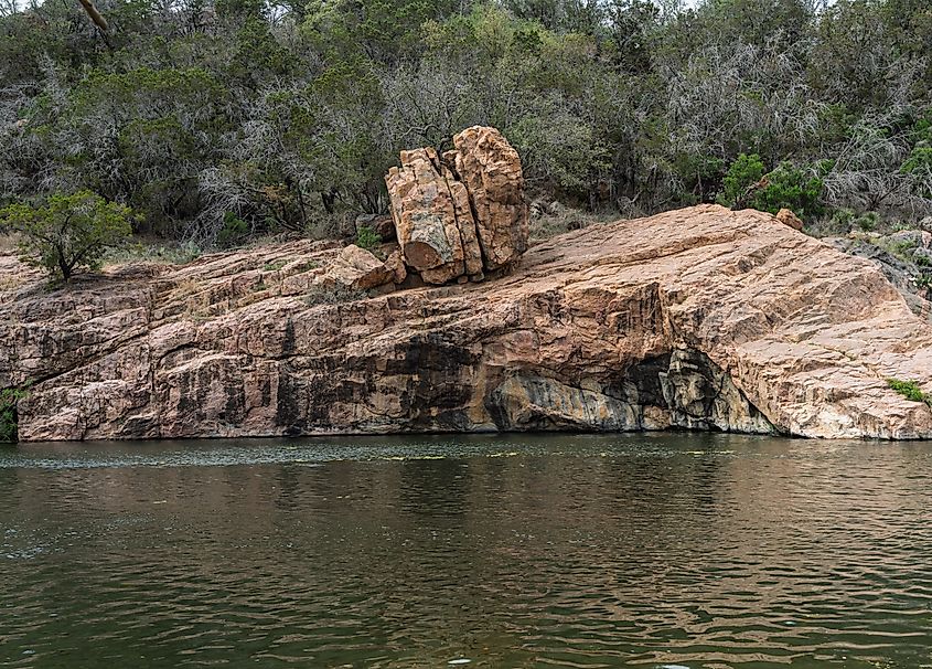 Interesting rock formation at the Devil's Waterhole swimming area in Inks Lake State Park, Texas.