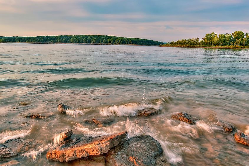 Long exposure of a Marine landscape, Rocks, and sand on the banks of Greers Ferry Lake in Heber Springs, Arkansas.