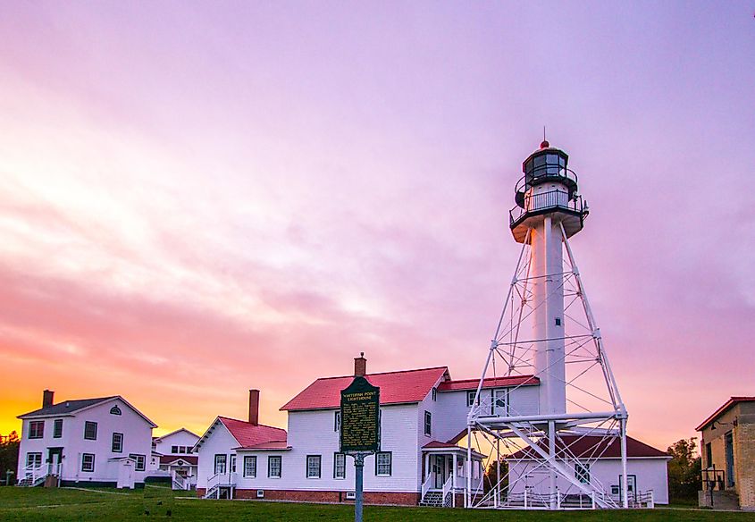 Exterior of the historic Whitefish Point Lighthouse on Whitefish Point Road near Paradise