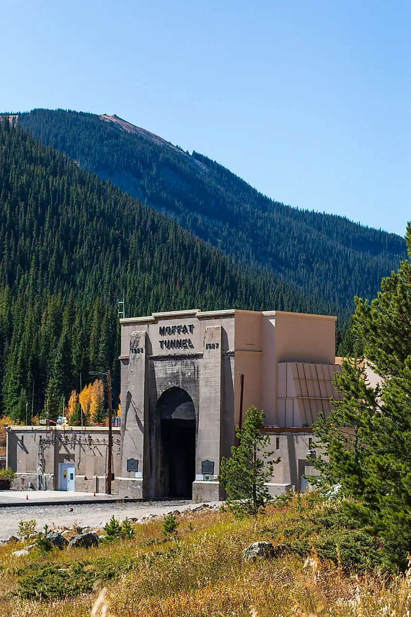 The Moffat Tunnel is a railroad tunnel and a waterway that cuts under and through the Continental Divide. It's located in Rollinsville, CO. The first train to pass through the tunnel was in 1928.