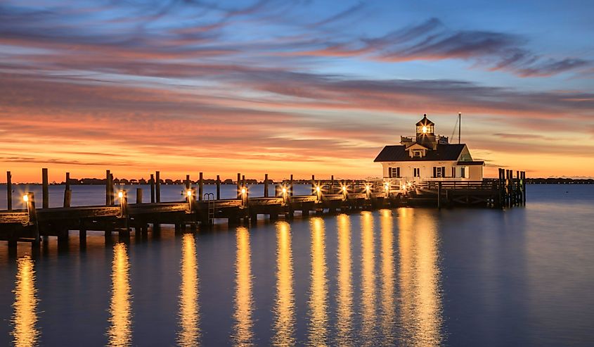 Roanoke Marshes screw-pile lighthouse on Shallowbag Bay in Manteo, North Carolina in the Outer Banks at sunrise.