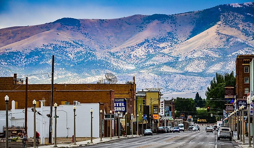 Route 50, the main street in western town of Ely, Nevada is seen against backdrop of mountain range.