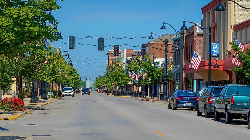 Main Street lined with historic brick buildings in downtown during summer. Belleville is the county seat for Saint Clare county Illinois.