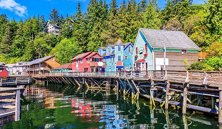 The historic boardwalk of Ketchikan at high tide.