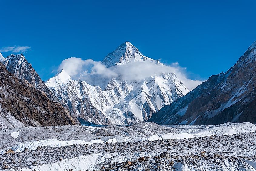 The sharp apex of K2 pierces through a halo cloud