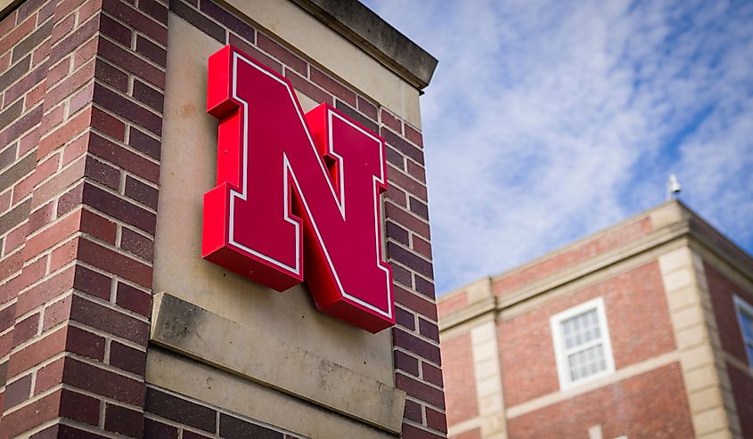 Nebraska Cornhuskers university logo on campus building