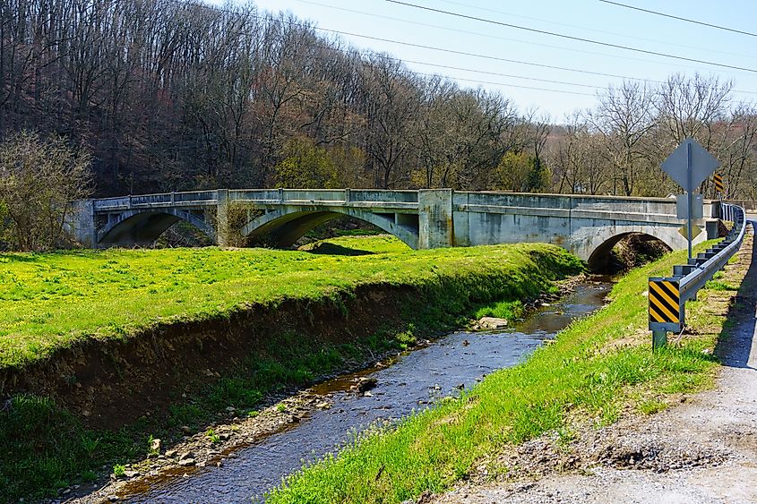 Embreeville, Pennsylvania: An arched bridge crosses the west branch of the Brandywine Creek near Embreeville in Chester County, PA.