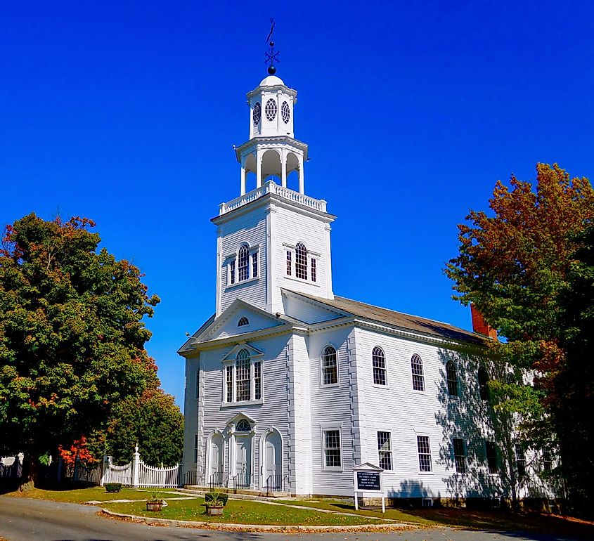 Autumn leaves change color by the Old First Church in Bennington, Vermont