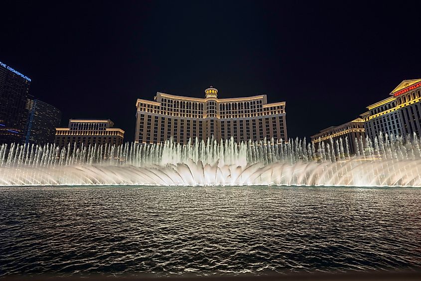 Fountains of Bellagio performing night water show in Las Vegas.