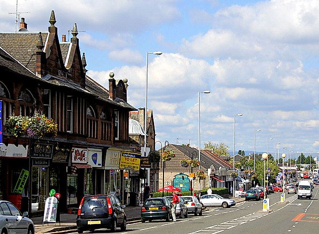 Giffnock, East Renfrewshire. The busy Fenwick Road in this popular district. Credit: John McLeish / Giffnock, East Renfrewshire. / CC BY-SA 2.0