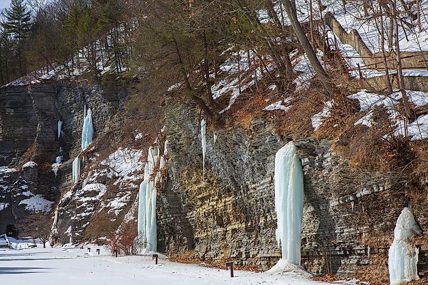 Frozen waterfalls appear on a cliff at Watkins Glen State Park, Watkins Glen, New York.