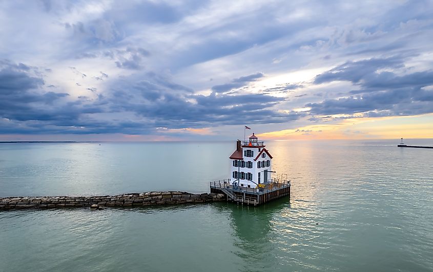 Lorain Harbor Lighthouse in Lake Erie at twilight.