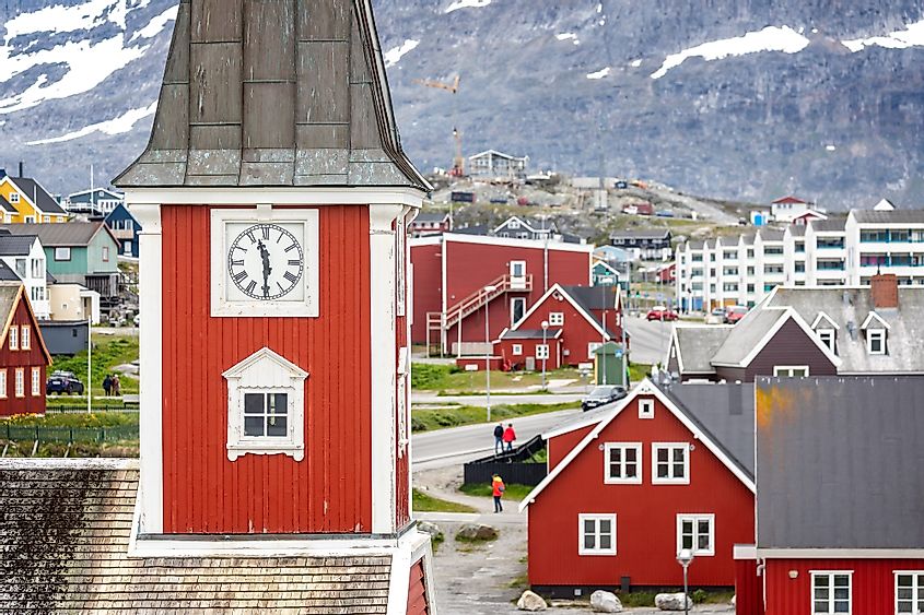 Close up of the clock tower of the iconic red wood Church of our Saviour in Nuuk, Greenland