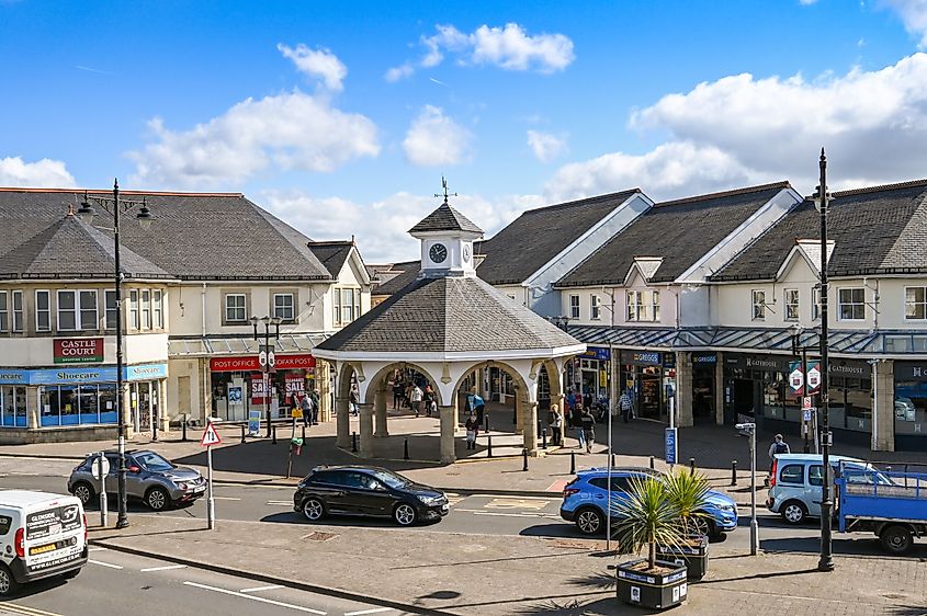 Clock tower at the entrance to the Castle Court shopping centre in the town of Caerphilly in Wales