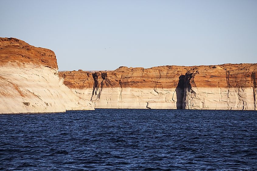 Low water bathtub ring on sandstone cliffs around Lake Powell in Glen Canyon National Recreation Area in Arizona.