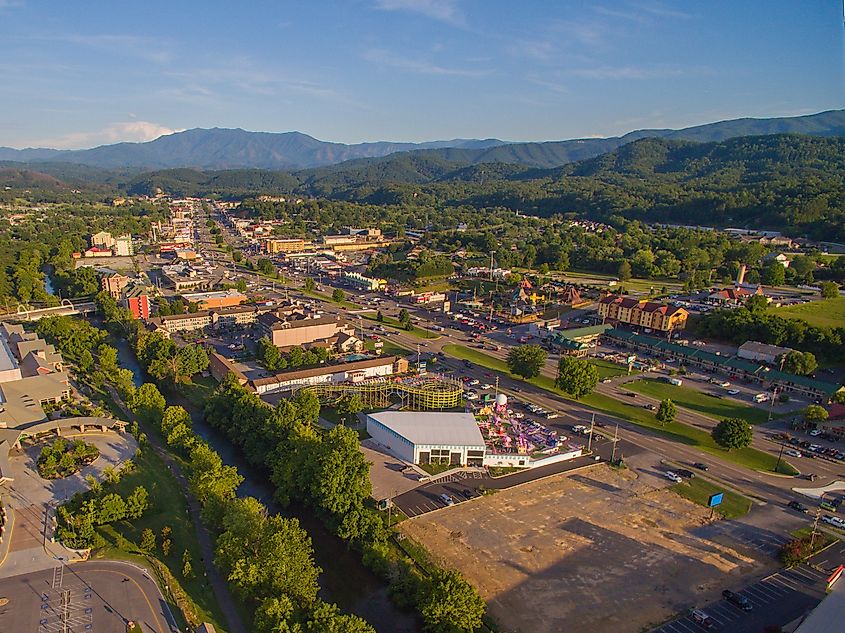 Aerial view of main strip, attractions, and mountains in Pigeon Forge, Tennessee
