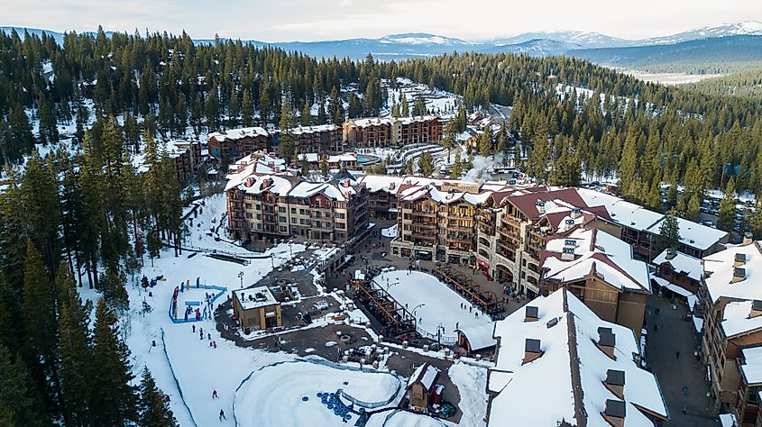 Aerial photo taken with drone of Northstar Resort, Lake Tahoe CA, USA, West Coast, wintertime after a heavy snow, with the lake in the background