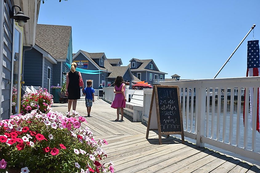 Tourists explore the waterfront shops of Duck, North Carolina