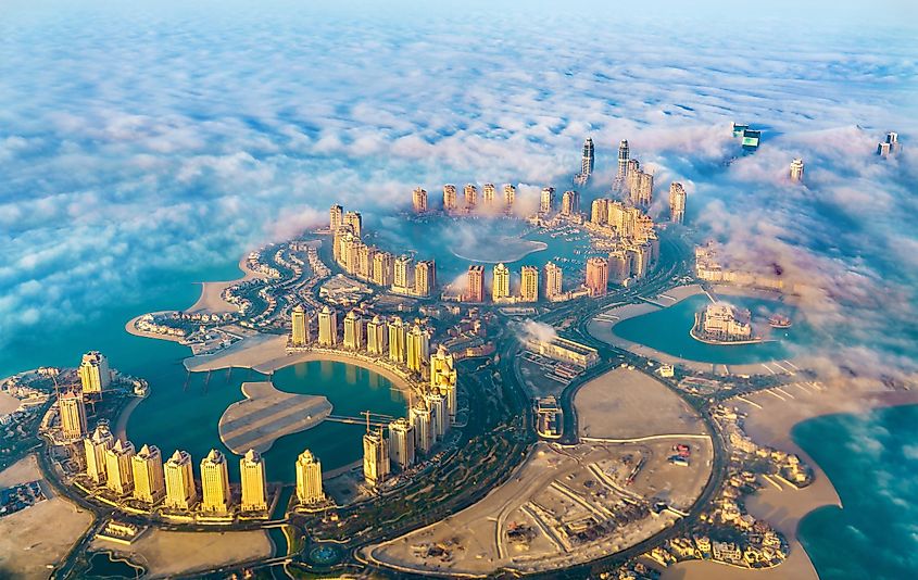 Aerial view of the Pearl-Qatar island in Doha through the morning fog