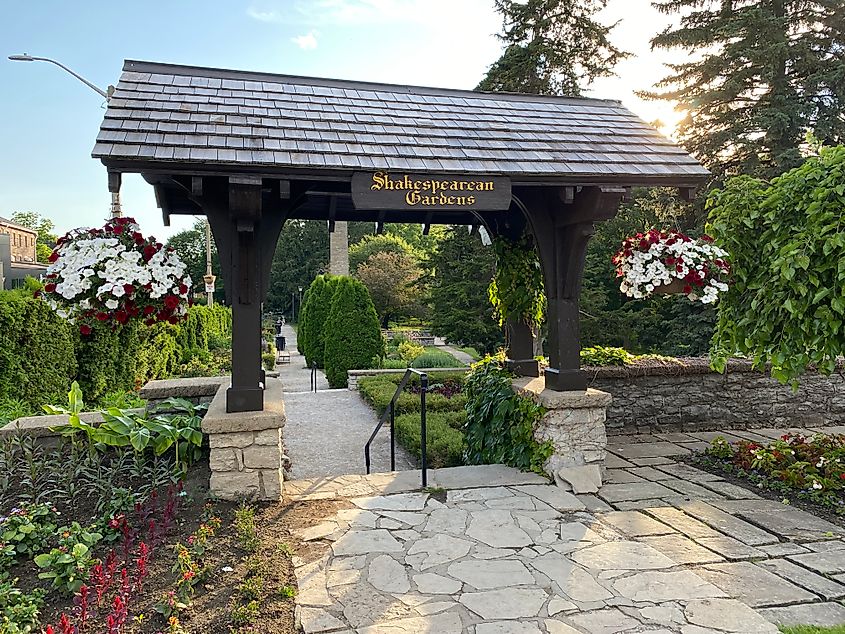 A wooden arch way marks the entrance to Stratford, Ontario's Shakespeare Gardens.