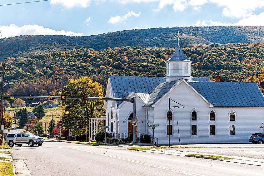 Street view in Monterey with a church and fall tree colors