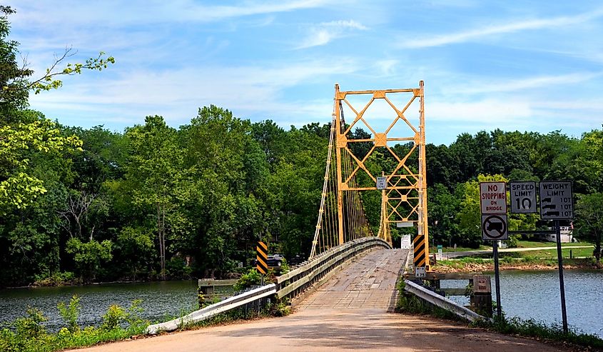 Historic suspension bridge over the White River is a historical landmark. Located in Beaver, Arkansas just Northwest of Eureka Springs, Arkansas.