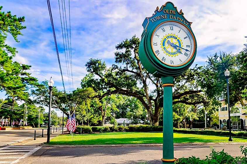 A two-sided street clock stands in Olde Towne Daphne in Daphne, Alabama.