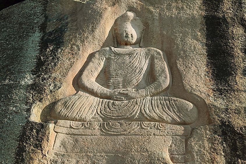 Buddhist rock carving in Manglawar damaged by the Taliban