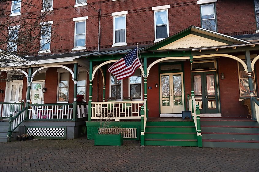 Historic row homes with wooden porches in Burlington, New Jersey.