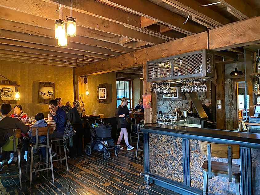 The woody interior of an old pub restaurant.