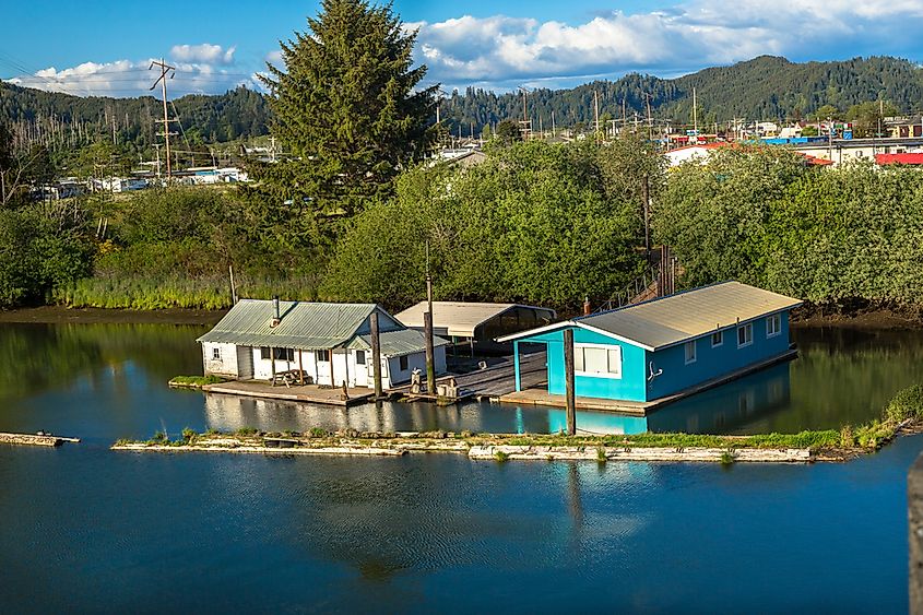 Boat houses on the Schofield Creek in summer, via Victoria Ditkovsky / Shutterstock.com