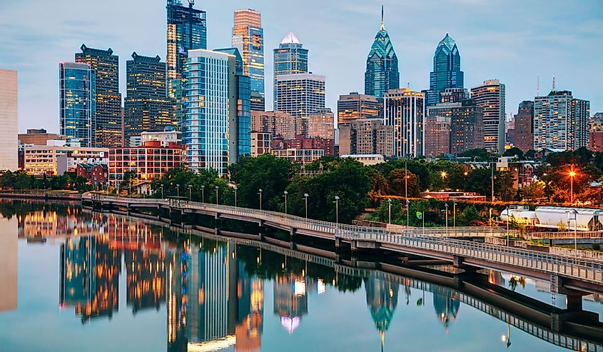 Philadelphia skyline at night with the Schuylkill river