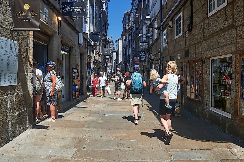 urists and locals stroll along diners in Rua do Franco. Editorial credit: Francisco Javier Diaz / Shutterstock.com