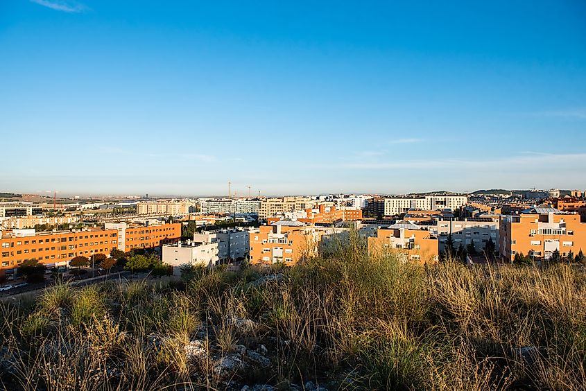 Cityscape of buildings and houses at sunrise in Rivas Vaciamadrid and Rivas Futura in Madrid, Spain.
