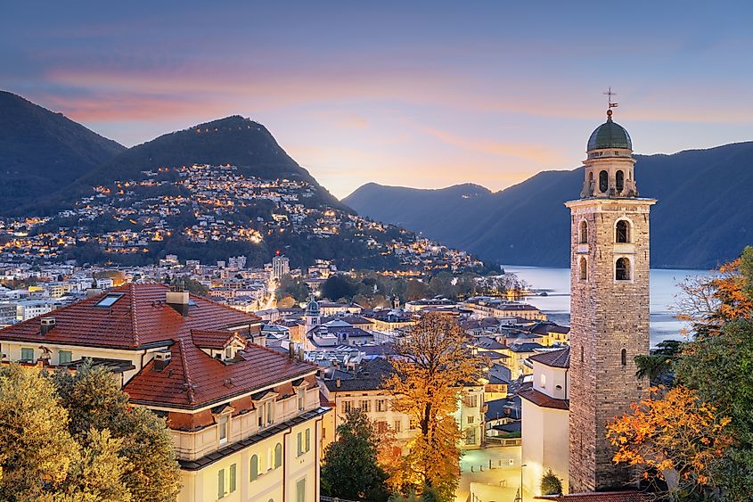 Lugano, Switzerland at dawn in autumn on Lake Lugano.