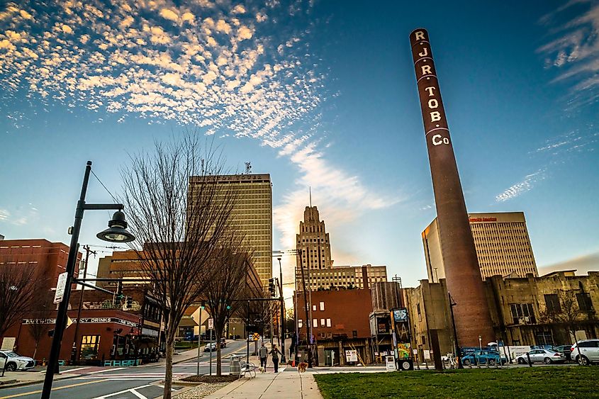 Winston-Salem Bailey Power plant with the downtown on the background, via Nadia Nice / Shutterstock.com