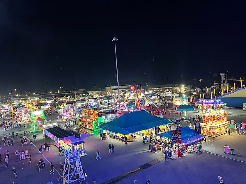 Visitors enjoying food stalls, rides, and entertainment at the Great New York State Fair 2025. Editorial credit: Minhaj_Graphix / Shutterstock.com