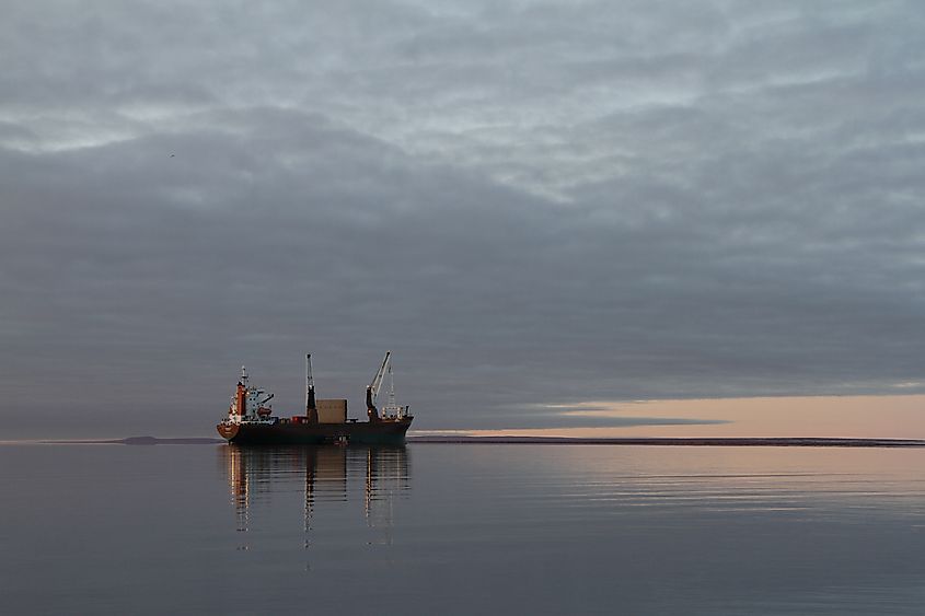 Resupply cargo barge on the waters of Nunavut near the community of Baker Lake in the Kivalliq Region