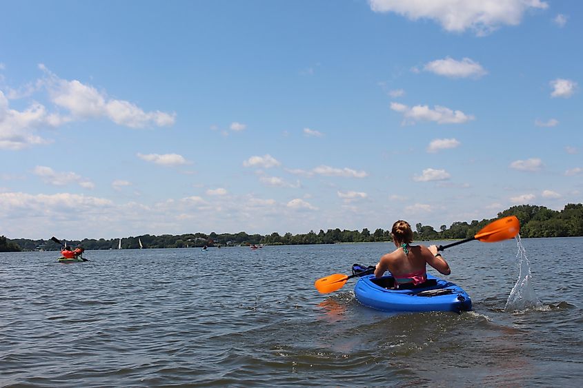 People kayaking in Lake Macbride in Solon, Iowa.