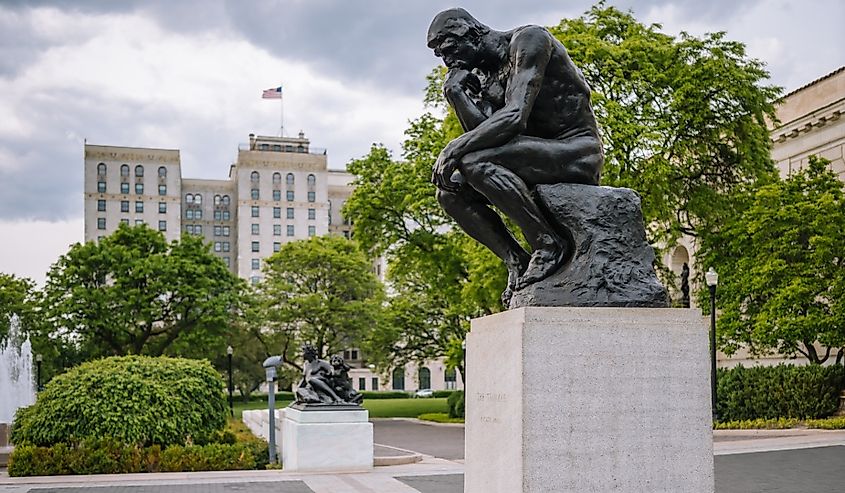 The Thinker by Auguste Rodin, modeled and cast in 1903, at the entrance of the Detroit Institute of Arts, Detroit, Michigan.