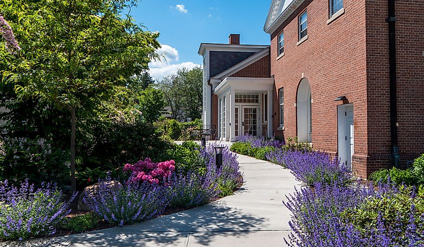 Brick building and flowers blooming in Stockbridge, Massachusetts