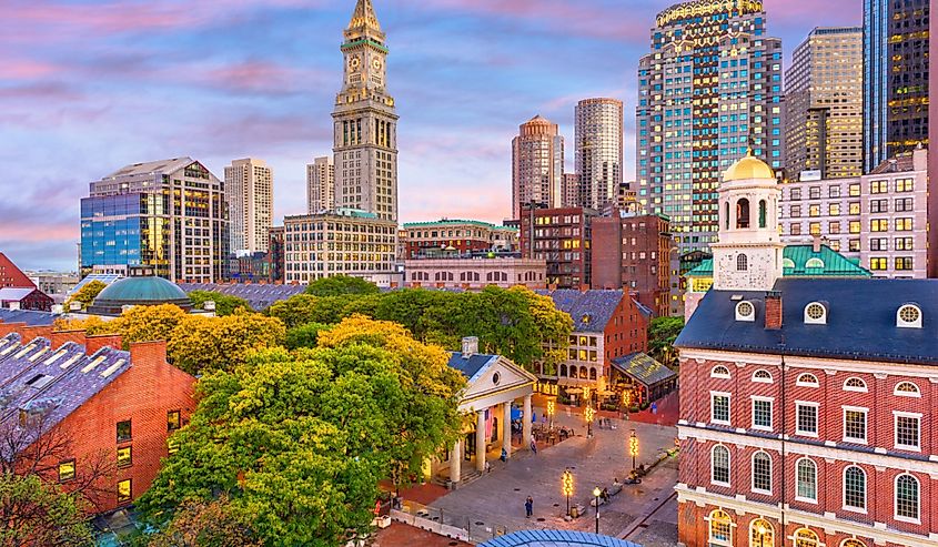 Boston, Massachusetts, USA skyline with Faneuil Hall and Quincy Market at dusk