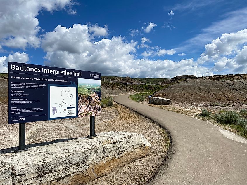 The start of the Badlands Interpretive Trail leads off into the striated prairie landscape.